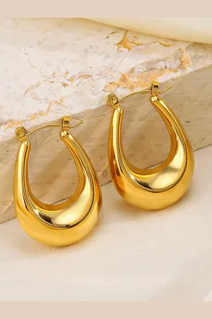 DressBerry Stainless Steel Gold-Plated Oval Shaped Hoop Earrings