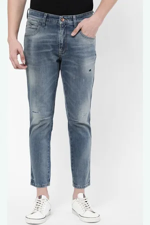 Wrangler Men Blue Skanders Slim Fit Low-Rise Mildly Distressed Heavy Fade Stretchable Jeans