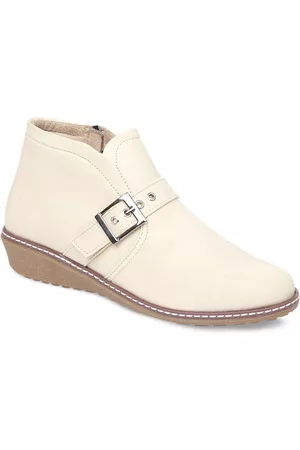 VALIOSAA Women Brown Solid Heeled Boots