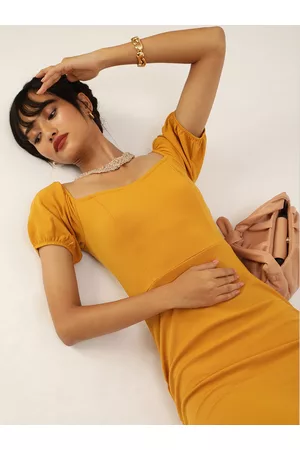 Veni Vidi Vici Enchanting Mustard Yellow Solid Puff Sleeves Bodycon Dress