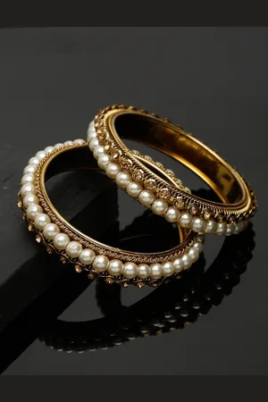 Shining Diva Set Of 2 Gold-Plated & White Pearl Beaded Embellished Antique Bangles