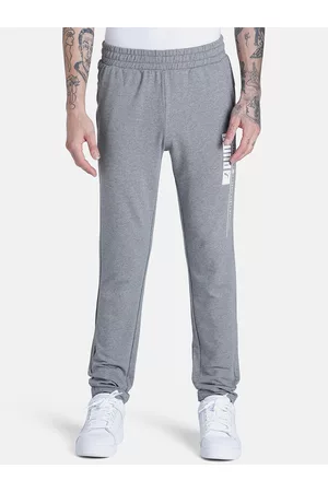 PUMA Men Slim Fit Futuristic Logo Track Pants