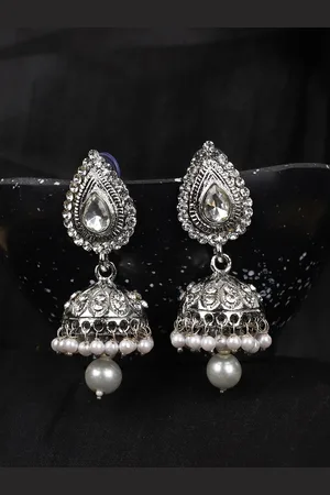 ANIKAS CREATION Silver-Plated Contemporary Jhumkas Earrings