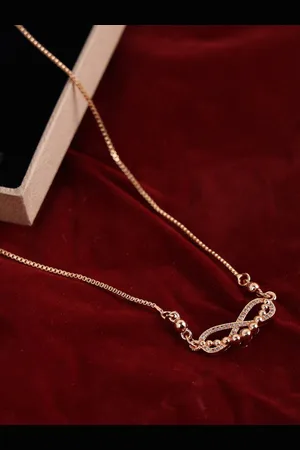 ANIKAS CREATION Gold-Plated AD-Studded Handcrafted Necklace