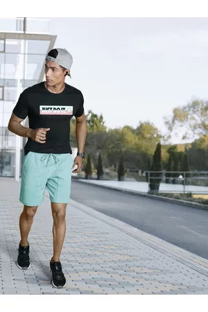 PUMA Men Solid Downtown Mid-Rise Regular Fit Sustainable Shorts