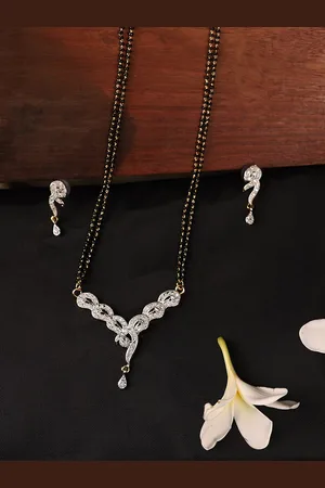 ANIKAS CREATION Gold-Plated Black & White Stone-Studded & Beaded Mangalsutra With Earrings
