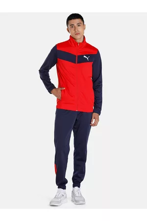 PUMA Men Red & Navy Blue Colourblocked Brand Logo Printed Cricket Tracksuits