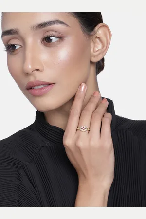 ESTELE Gold plated clove inspired ring with CZ and purple colored stone for women