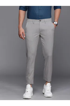 Buy Men Brown Slim Fit Textured Pleated Formal Trousers Online - 917194 | Louis  Philippe