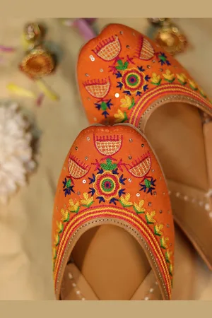 GLAM STORY Women Orange Embellished Ethnic Mojaris with Embroidered Flats