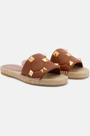 VALENTINO GARAVANI Roman Stud leather and raffia slides