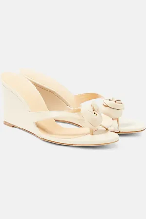 MAGDA BUTRYM Floral-appliquÃ© leather wedge sandals