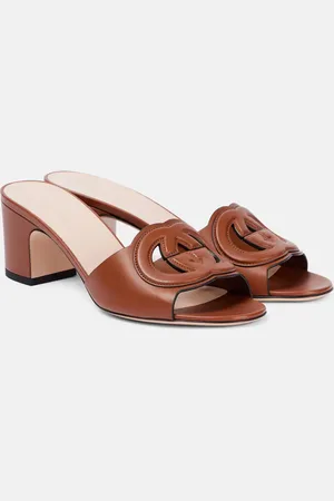Gucci Interlocking G leather mules
