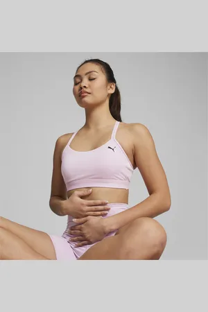 Puma Training Evoknit Seamless Light Support Sports Bra In Soft Pink for  Women