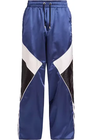 Balmain monogram-print Track Pants - Blue