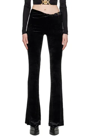 x Dua Lipa gathered jersey flared pants in black - Versace