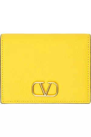 VALENTINO GARAVANI: VLogo wristlet clutch bag - Yellow Cream