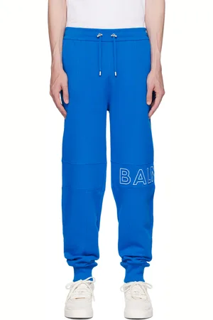 Balmain monogram-print Track Pants - Blue