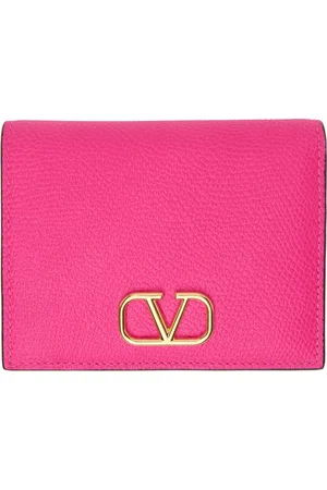 VALENTINO GARAVANI: VLogo wristlet clutch bag - Yellow Cream