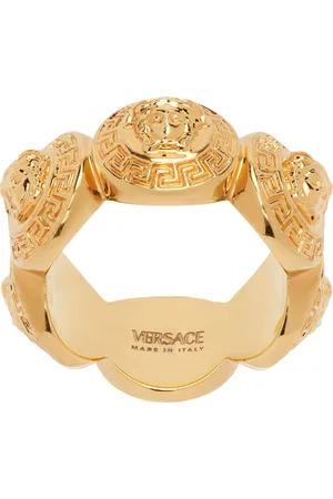 Versace, ring, 18K guld och diamanter ca 0.12 ct totalt. Märkt Versace. -  Bukowskis