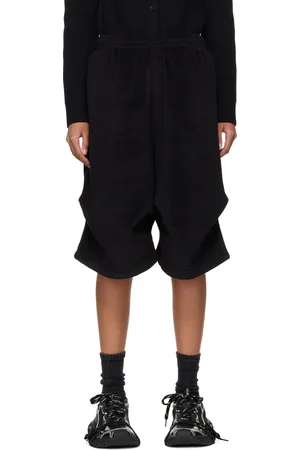 We11 Done Black Tuck Shorts