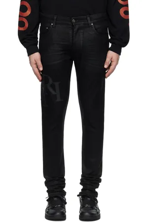 AMIRI Black Waxed Staggered Logo Skinny Jeans