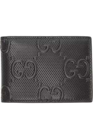 GG Embossed Leather Duffle Bag in Black - Gucci