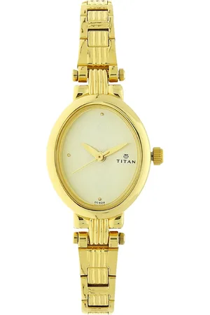 Titan Quartz Analog Champagne Dial Watch For WomenWith Golden Stainless Steel Strap