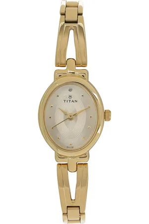 Titan Quartz Analog Champagne Dial Golden Stainless Steel Strap Oval Shaped Watch For Women